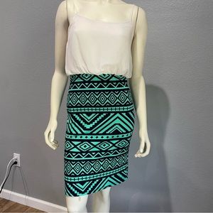 Papaya teal green pattern dress in size M.